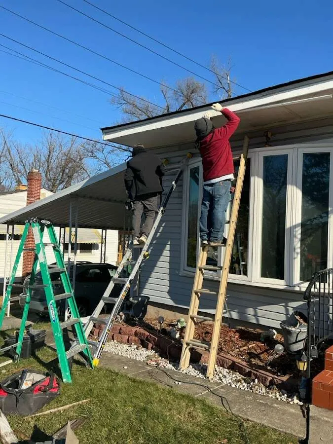 Restoration crew performing exterior repair in Williamson